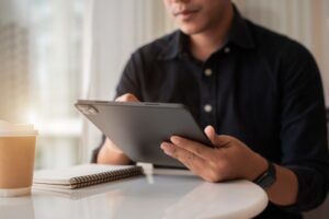 businessman-sitting-at-a-table-at-home